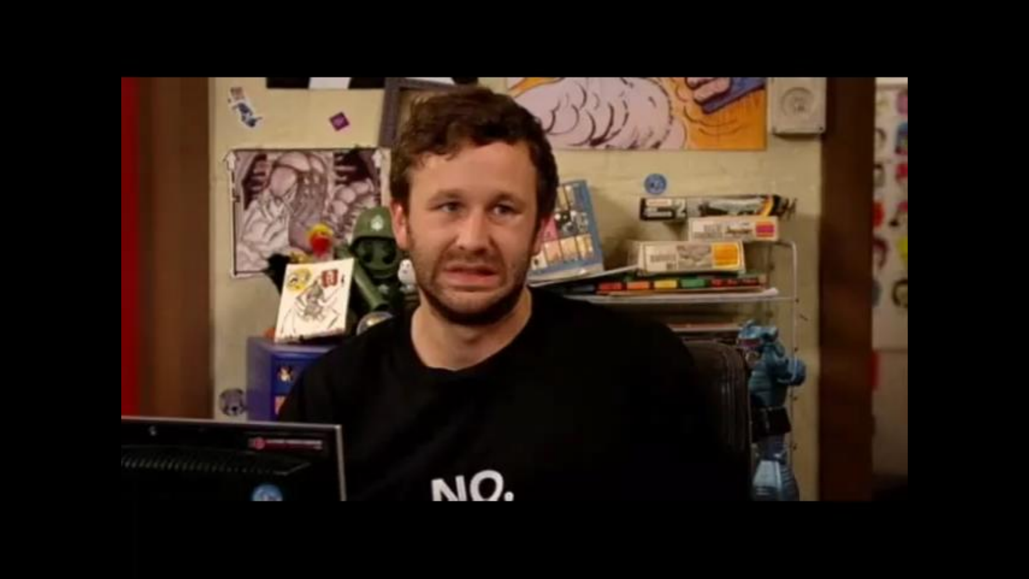 The IT Crowd's Roy in a black "NO." t-shirt, giving a flat, deadpan stare.